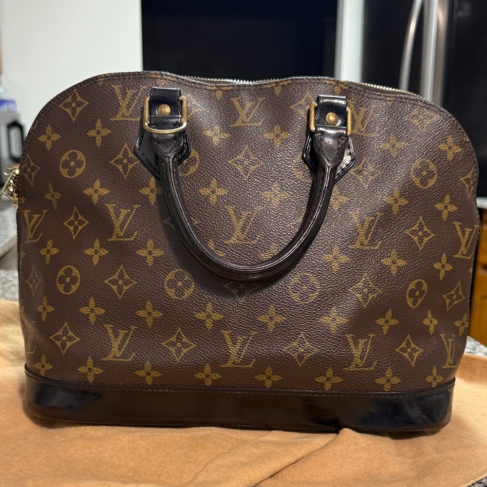 Louis Vuitton Alma Brown and Gold Monogram Tote dyed and sealed black